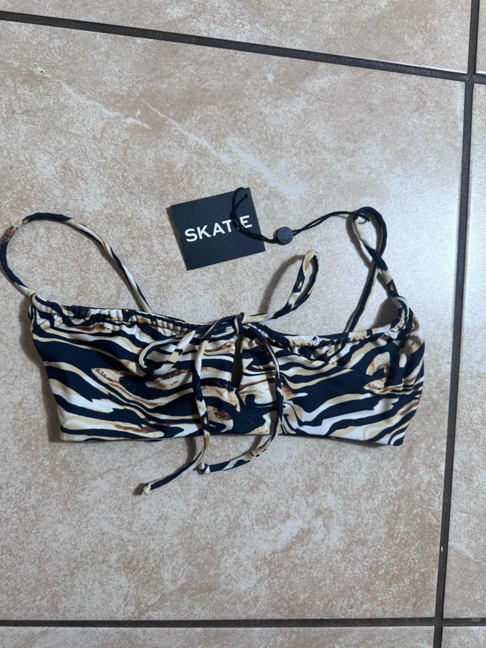 Skatie Swirl-Print Bikini Top in Black, Cream, and Brown